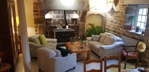 Posezení v ubytování Hameau de Leignoua