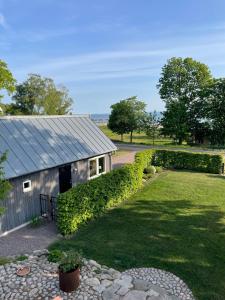 Zahrada ubytování Fiskarstugan i Norra Häljaröd