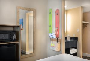 a room with surfboards hanging on the wall at Surfside Beach Oceanfront Hotel in Myrtle Beach
