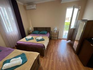Imeri Hotel客房内的一张或多张床位