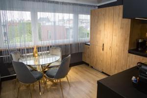 Posezení v ubytování Apartament NEPTUN Centrum + 28 fotografií