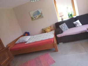 Ένα ή περισσότερα κρεβάτια σε δωμάτιο στο Ferienwohnung Otto