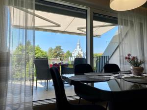 Balkón alebo terasa v ubytovaní Atrium Apartman Hévíz mit Panoramaterrasse und Tiefgarage