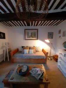 Ένα ή περισσότερα κρεβάτια σε δωμάτιο στο Studio Wanderlust
