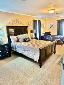 a bedroom with a large bed in a room at The Hooper House in Grenada