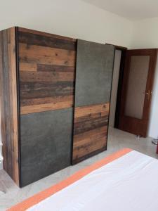 Łóżko lub łóżka w pokoju w obiekcie Apartman Kačić