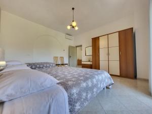 Postel nebo postele na pokoji v ubytování Cozy Apartment Mandula