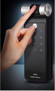 a hand is pushing a button on a phone at Your Crib - kasara -19 D tower 1 in Manila