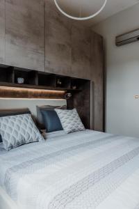 Giường trong phòng chung tại Trullo Della Murgia - Villa