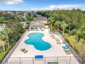 an overhead view of a swimming pool at a resort at Family retreat w pool near Disney & parks in Orlando