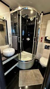 Ένα μπάνιο στο Apartament Festiwalowy
