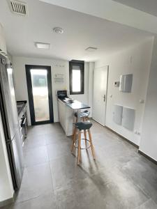 Kuchyň nebo kuchyňský kout v ubytování Apartamento Mar Jonica