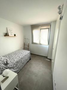 Postel nebo postele na pokoji v ubytování Apartamento Mar Jonica