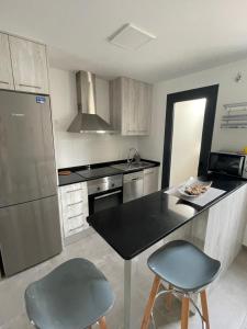 Kuchyň nebo kuchyňský kout v ubytování Apartamento Mar Jonica