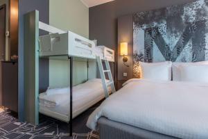 Postel nebo postele na pokoji v ubytování Radisson Blu Metropol Helsingborg