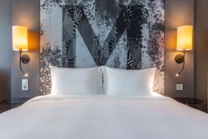 Postel nebo postele na pokoji v ubytování Radisson Blu Metropol Helsingborg