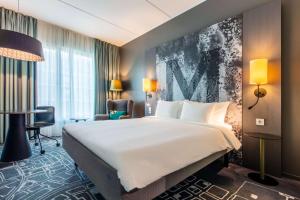 Postel nebo postele na pokoji v ubytování Radisson Blu Metropol Helsingborg