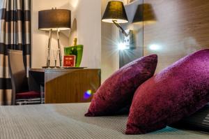 Postel nebo postele na pokoji v ubytování Hotel Regio Cádiz