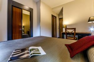 Postel nebo postele na pokoji v ubytování Hotel Regio Cádiz