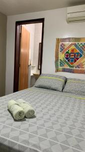 Кровать или кровати в номере Pousada Querência Maceió