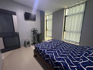 Un pat sau paturi într-o cameră la Adrian´s Hotel