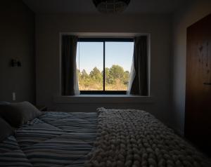 Krevet ili kreveti u jedinici u objektu Casa en la naturaleza con vistas a las Sierras