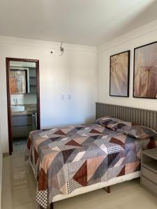 Postel nebo postele na pokoji v ubytování Casa Completa com piscina, 800m da praia de Jauá