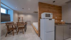 Kuchyň nebo kuchyňský kout v ubytování Relax Hotel Takayama Station