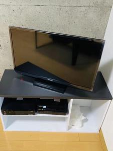 a flat screen tv sitting on top of a shelf at Marvelous Kokubunji - Vacation STAY 80468v in Kokubunji