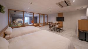 TV a/nebo společenská místnost v ubytování Relax Hotel Takayama Station