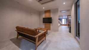 TV a/nebo společenská místnost v ubytování Relax Hotel Takayama Station