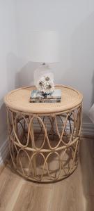 a coffee table with a cake on top of it at Boutique Beach House in the HEART of St. Kilda in Melbourne +25 photos