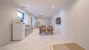 Kuchyň nebo kuchyňský kout v ubytování Relax Hotel Takayama Station