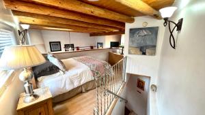 Voodi või voodid majutusasutuse Casas de Guadalupe - Sante Fe Vacation Rentals toas