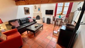 Televiisor ja/või meelelahutuskeskus majutusasutuses Casas de Guadalupe - Sante Fe Vacation Rentals