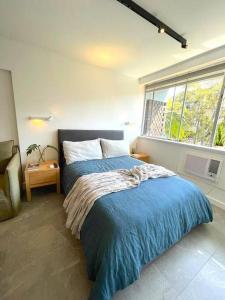 Katil atau katil-katil dalam bilik di Sunny & peaceful apartment in Sydney - Rushcutters bay