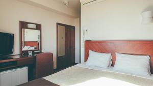 Postel nebo postele na pokoji v ubytování Kuretake-Inn Fujisan + 18 fotografií