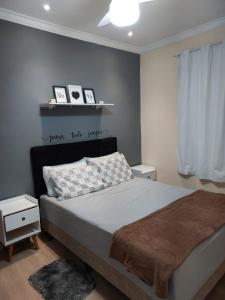 Casa da Montanha tesisinde bir odada yatak veya yataklar