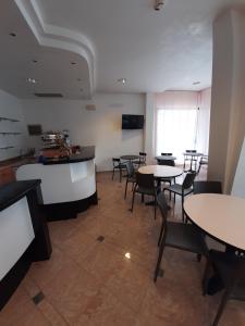 TV a/nebo společenská místnost v ubytování Hotel Altamarea