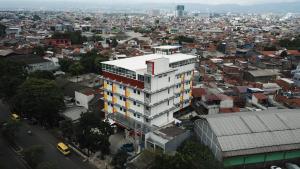an overhead view of a city with a building at Front One Hotel Pasir Koja Bandung in Bandung