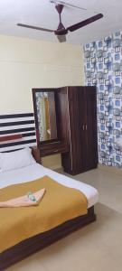Postel nebo postele na pokoji v ubytování Hotel Orginal Residency