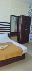 Postel nebo postele na pokoji v ubytování Hotel Orginal Residency