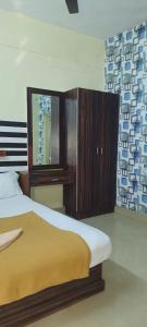 Postel nebo postele na pokoji v ubytování Hotel Orginal Residency + 9 fotografií