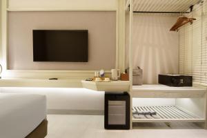 TV a/nebo společenská místnost v ubytování M City Hotel Saigon
