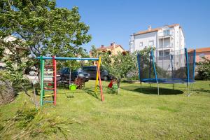 Детска площадка в Apartments Dadic with parking & playground