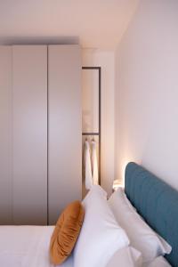 Postel nebo postele na pokoji v ubytování [150 mt dal mare] FillYourHomeWithLove Apartment + 19 fotografií