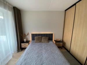 Una cama o camas en una habitación de MY Residence