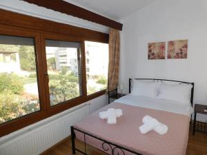 Postel nebo postele na pokoji v ubytování Villa Dima