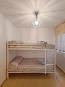 Posteľ alebo postele v izbe v ubytovaní Family Apartment with Sea View by NRAS