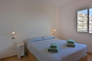 Posteľ alebo postele v izbe v ubytovaní Family Apartment with Sea View by NRAS